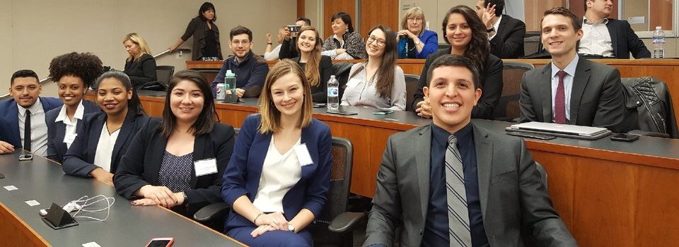 2017-2018 LaLSA Moot Court sitting in a classroom at UC Davis School of Law