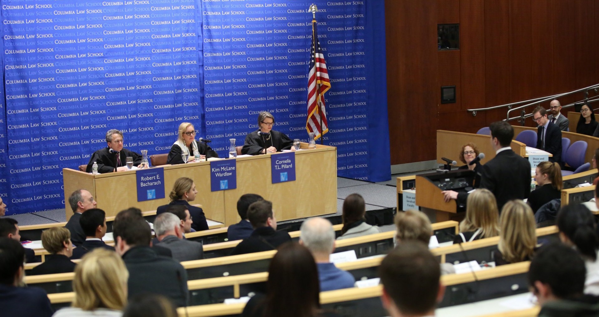 Photo of three U.S. Circuit Court judges asking a finalist questions during the 2018 Stone finals.